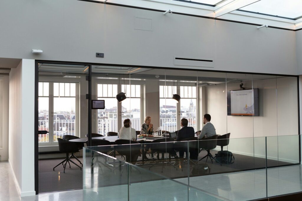 people sitting on chair inside building